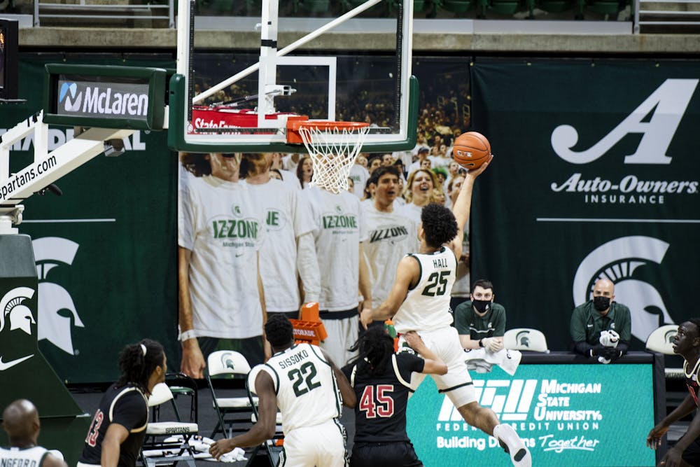 <p>Sophomore forward Malik Hall (25) shoots a basket during the game against Nebraska on Feb. 6, 2021, at the Breslin Center. The Spartans defeated the Cornhuskers, 66-56.</p>