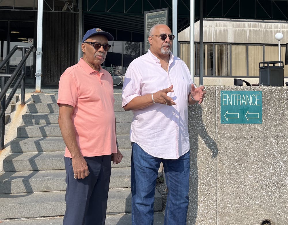 Detroit activists Rev. Horace Sheffield, III andAdolph Mongo call for the resignation of MSU trustee Diane Byrum at a press conference in front of the Frank Murphy Hall of Justice on June 20, 2023.