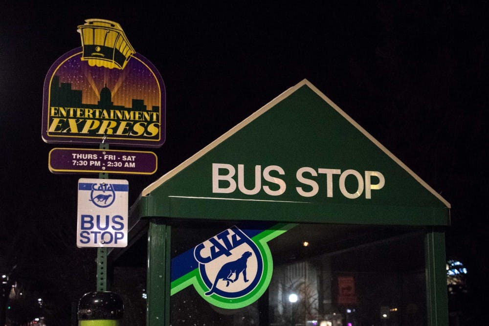 Pictured is the signage at the CATA Entertainment Express bus stop on Grand River Avenue. The bus runs along CATA's 4 route.