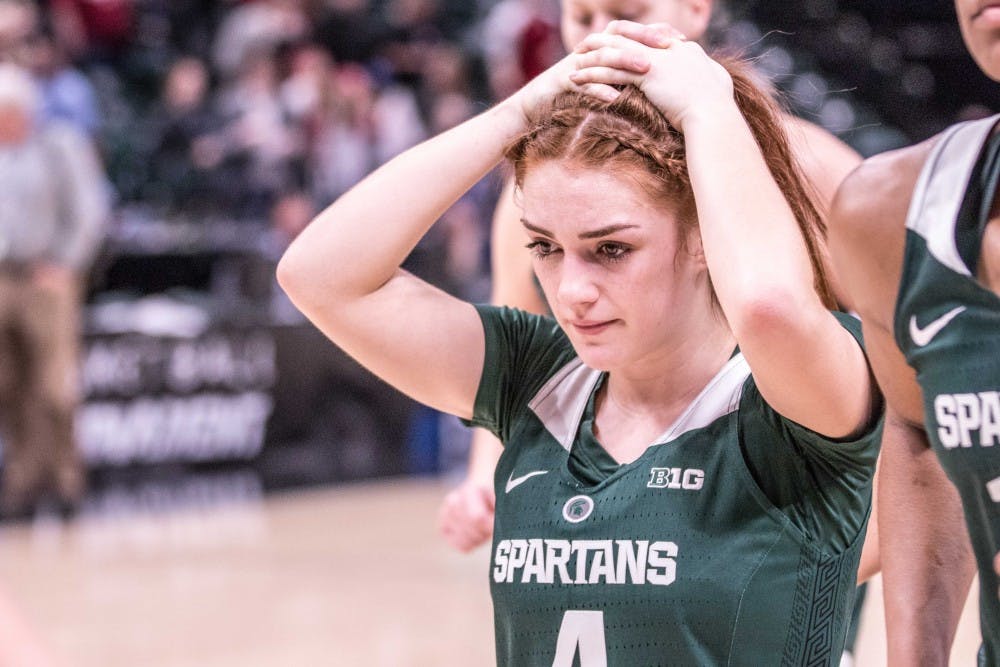 <p>Sophomore guard Taryn McCutcheon (4) walks off the court after the game against Indiana on March 1, 2018 at Bankers Life Fieldhouse. The Spartans fell to the Hoosiers, 111-109, in 4OT.</p>