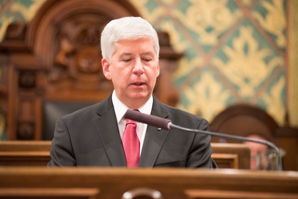 <p>Michigan Gov. Rick Snyder addresses the audience on Jan. 19, 2016 during the State of the State Address at the Capitol in Lansing.</p>