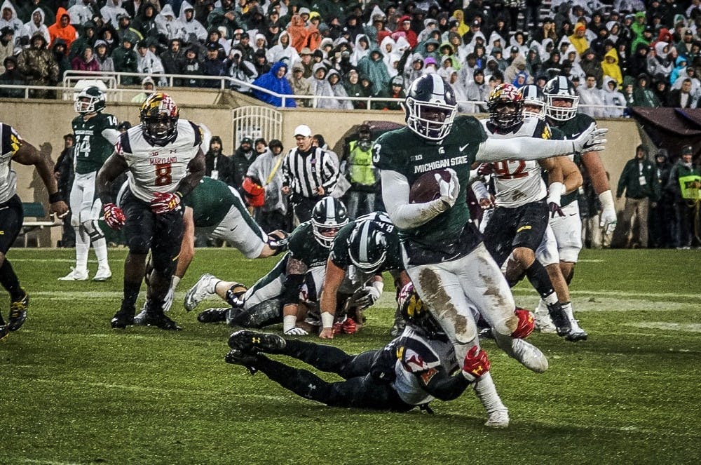 Spartans Turn To Run Game In Weather Filled Win Over