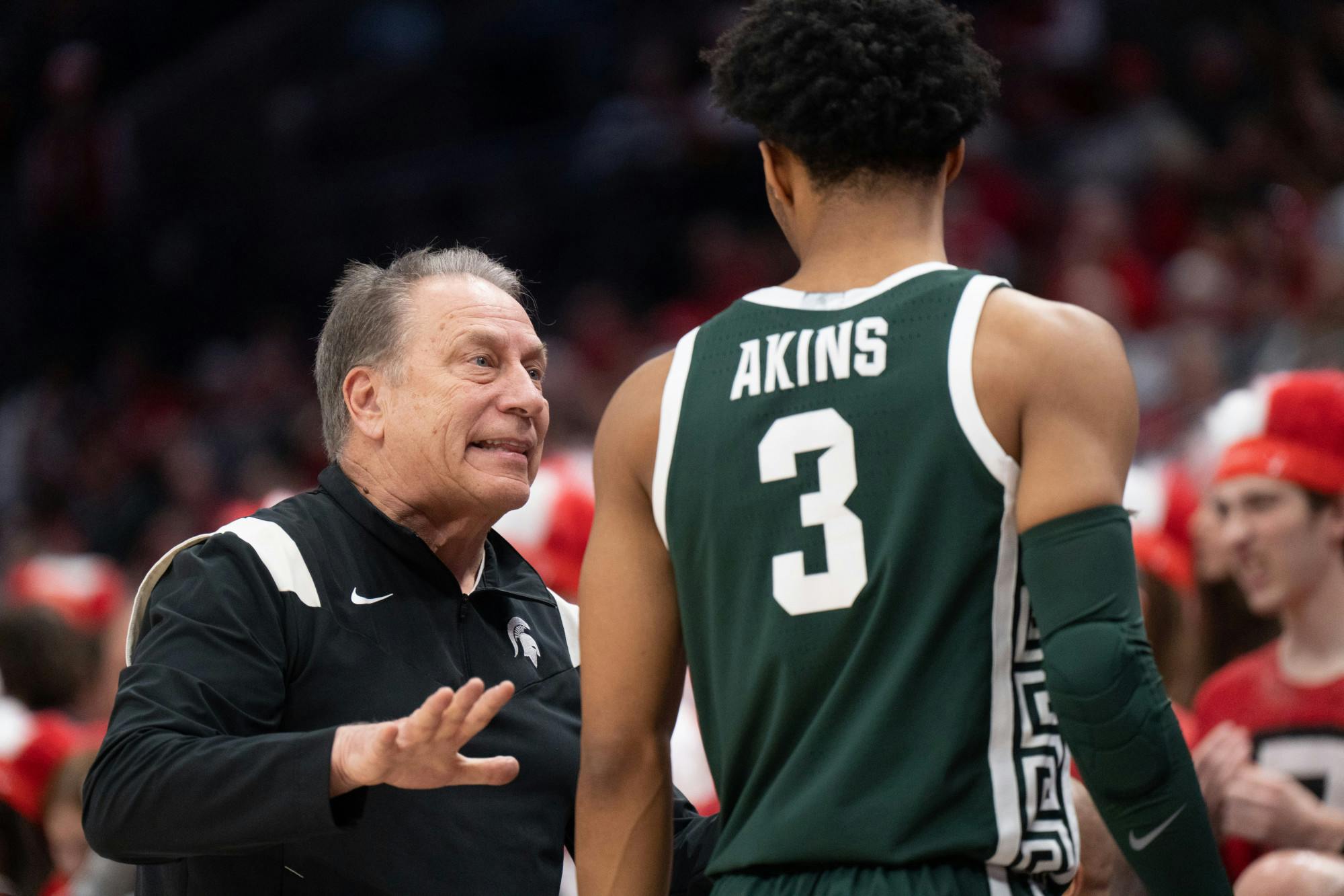 <p>Head Men's Basketball Coach Tom Izzo (left) gives sophomore guard Jaden Akins a quick word of instruction on the sidelines of the Schottenstein Center in Columbus, Ohio on Sunday, Feb. 12, 2023. The Spartans beat the Buckeyes 62-41.</p>