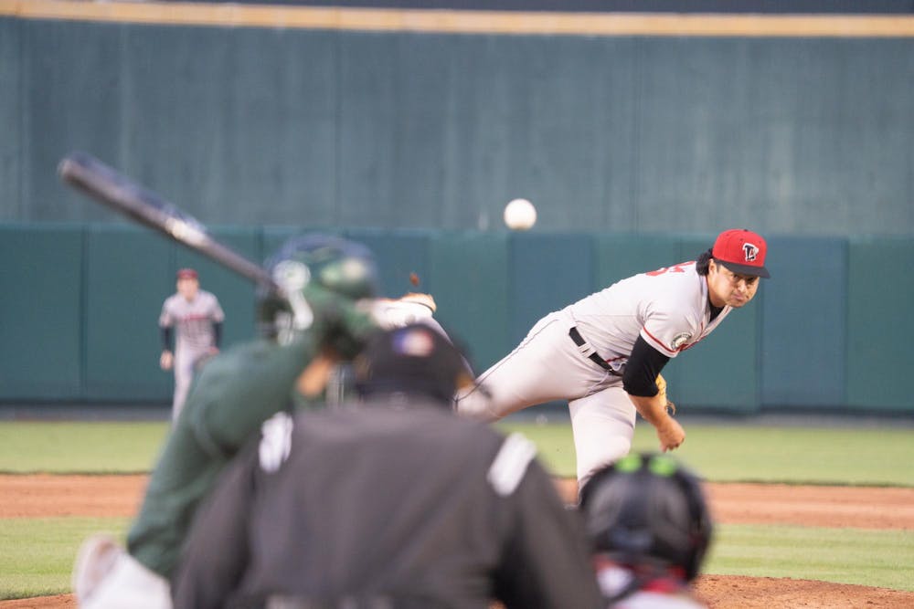 Lansing Lugnuts pitcher Hunter Brealt deals a pitch to a Spartan batter on Wednesday, April 3, 2024 at Jackson Field in Lansing, MI. The Lugnuts beat the Michigan State Spartans 18-0 in the "Cross Town Shodown" exhibition match.