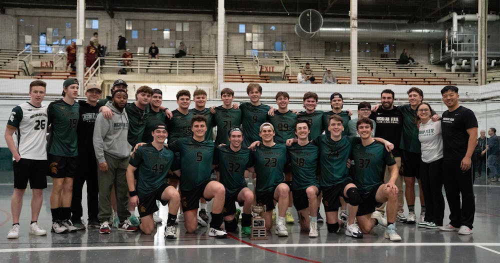 Michigan State University’s club dodgeball team celebrates as champions of the Michigan Dodgeball Cup for the fifth consecutive year at Demonstration Hall on Feb. 21, 2026.