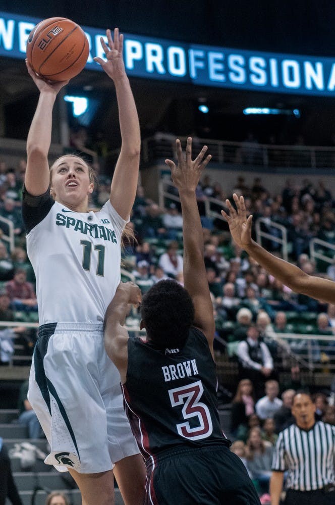 	<p>Junior forward Annalise Pickrel goes to shoot the ball during the game against Temple on Dec. 29, 2012, at Breslin Center. Pickrel was the leading scorer for the Spartans with a total of 16 points, helping them beat the Owls 57-47. Natalie Kolb/The State News</p>