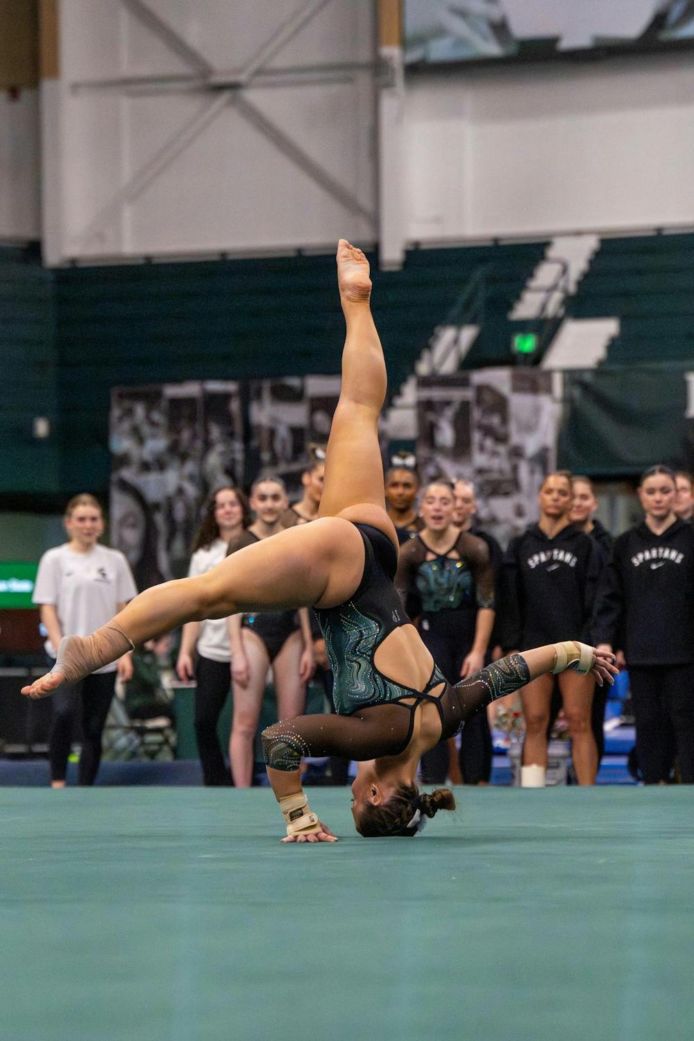<p>Korynne Marquart nears the end of her floor routine during Michigan State’s meet against Brown at Jenison Field House in East Lansing, Mich., on Sunday, March 15, 2026.</p>