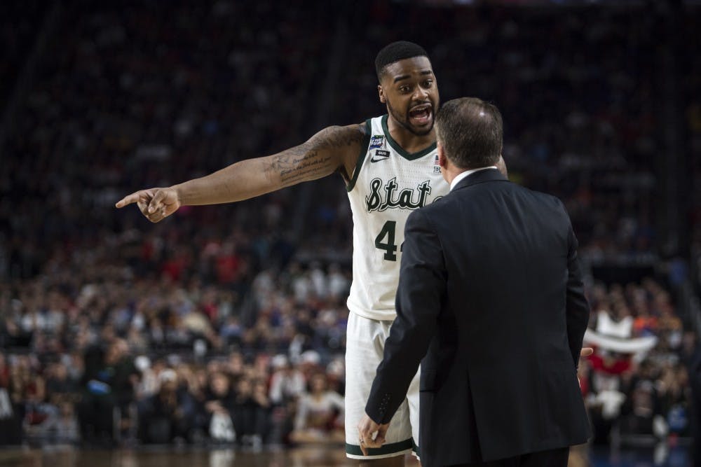 Junior forward Nick Ward (44) talks with Michigan State head coach Tom Izzo during the second half of the NCAA Final Four game against Texas Tech at U.S. Bank Stadium in Minneapolis on April 6, 2019. The Spartans lost to the Red Raiders 61-51.  (Nic Antaya/The State News)