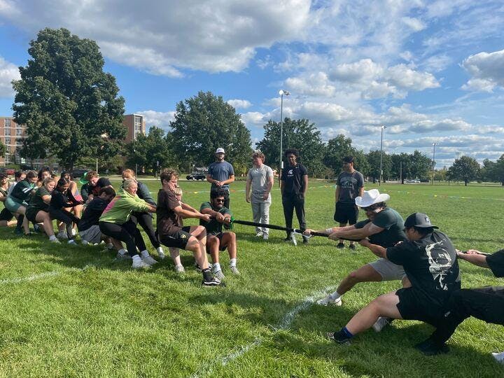 MSU students during a tug-of-war at Camp Gains Sunday, Sep. 8. The event combining all things lifting at MSU took place for the first time on IM East Field. 