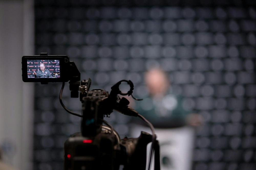 <p>Cameras record Michigan State head men's basketball coach Tom Izzo speaking at the first day of practice press conference at the Breslin Center in East Lansing, Mich., on Tuesday, Sept. 22, 2026.</p>