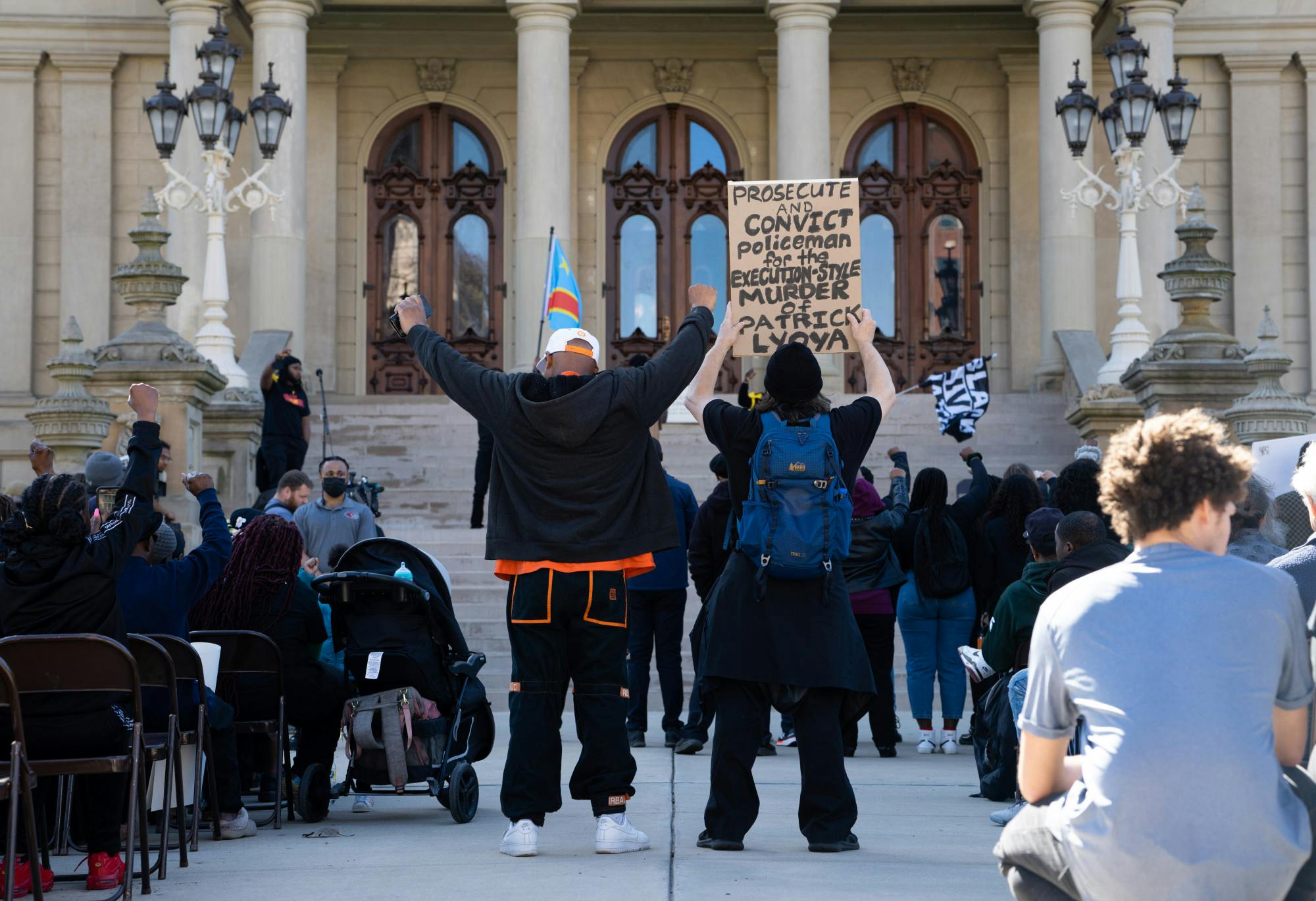 Black Lives Matter protesters gather at the capitol building on April 21, 2022, following the fatal shooting of Patrick Lyoya in Grand Rapids, Michigan.