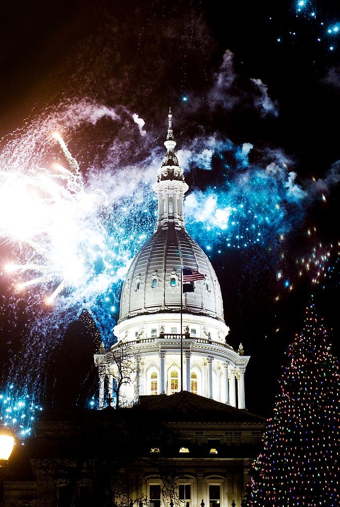 	<p>Fireworks burst over the Capitol at the 27th annual Silver Bells in the City celebration. Matt Radick/The State News</p>
