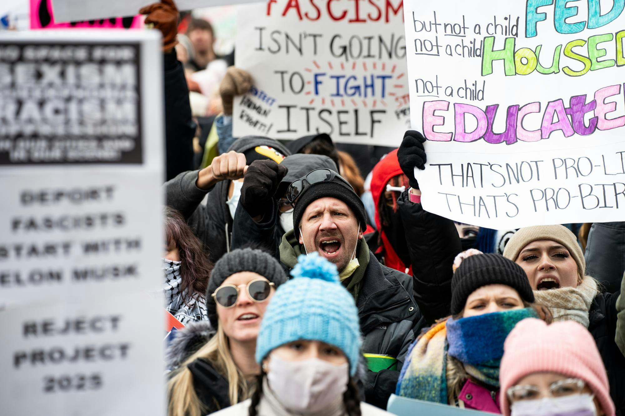 Protesters shout at the Michigan Capitol Building in Lansing, Michigan on Feb. 5, 2025. Protesters gathered at the Michigan Capitol Building to demonstrate against President Donald Trump's cascade of executive orders.