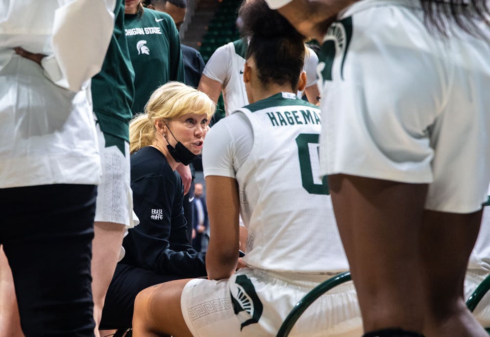 <p>Women&#x27;s basketball coach Suzy Merchant gives a pep talk to her team during a timeout called in the first quarter of the game. The Spartans crushed the Bulldogs, 100-60, which led coach Suzy Merchant to her 300th win with Michigan State on Nov. 19, 2021.</p>