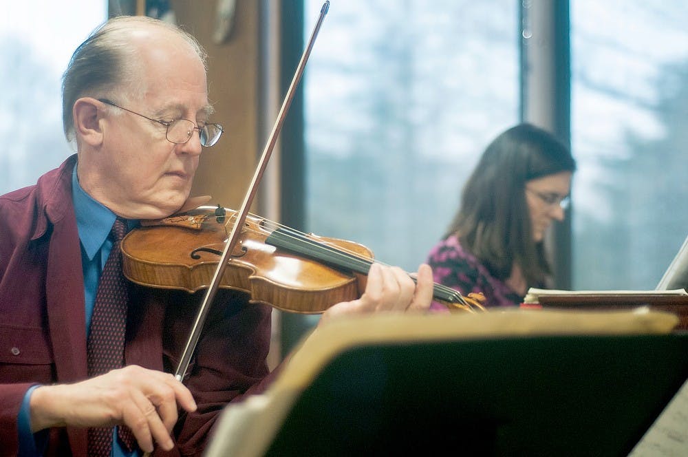 	<p>Walter Verdehr, <span class="caps">MSU</span> professor of violin, performs a classical piece for members of the Burcham Hills Retirement Community, located at 2700 Burcham Dr., on Wednesday, Feb. 13, 2013. The Verdehr trio has been performing specifically commissioned works for about 40 years. Danyelle Morrow/The State News</p>