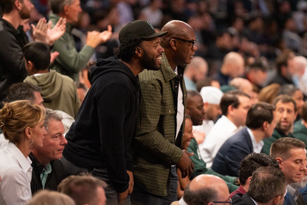 <p>Michigan State head football coach Mel Tucker cheers during the Spartans' Sweet Sixteen matchup with Kansas State at Madison Square Garden on Mar. 23, 2023. The Spartans lost to the Wildcats 98-93 in overtime.</p>
