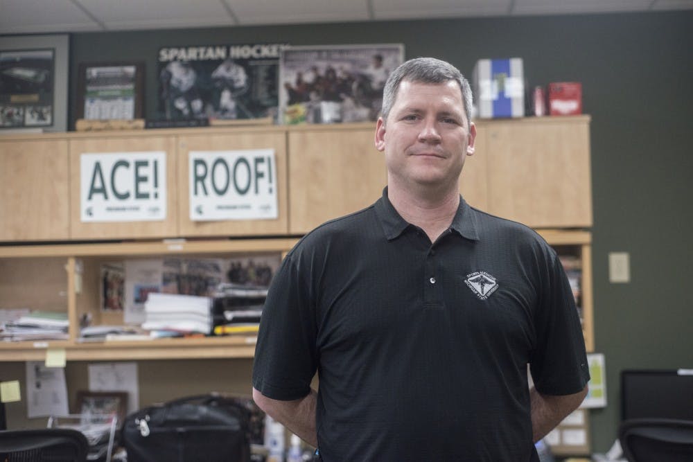 Orthopedic Surgeon and team physician for MSU Hockey Dr. Andrew Schorfhaar poses for a portrait on Jan. 21, 2016 at the MSU Sports Medicine offices.