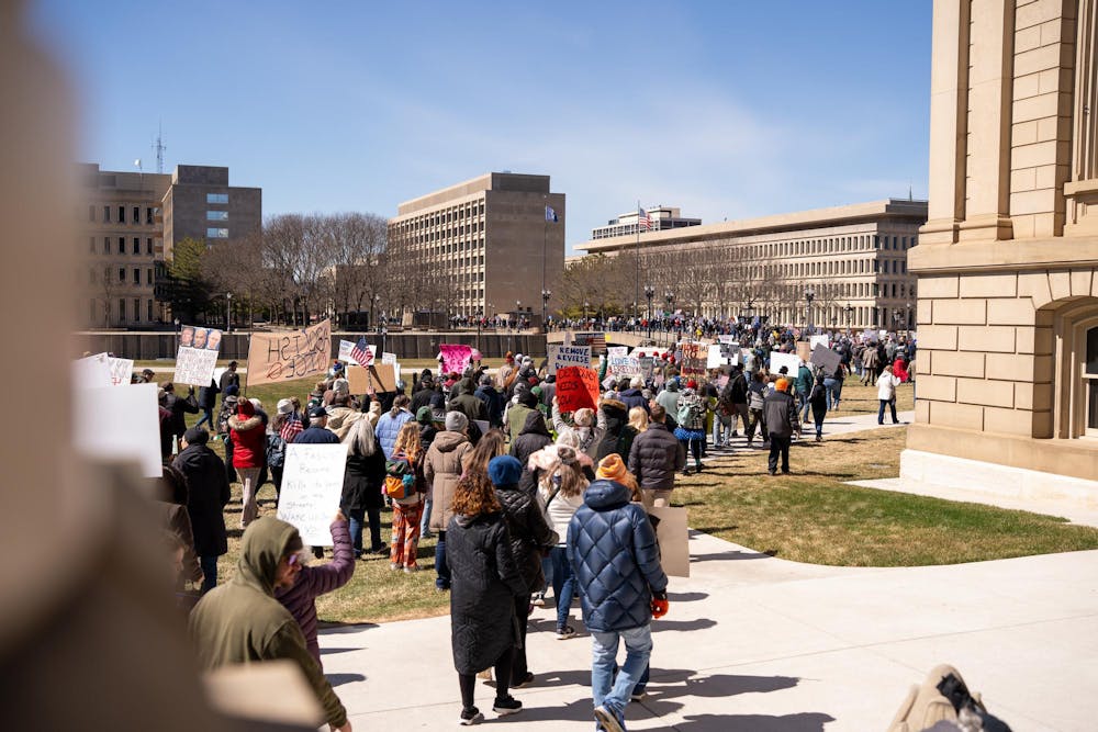 <p>Protestors march together during the No Kings Protest at the Michigan State Capitol in Lansing, MI on March 28, 2026.</p>