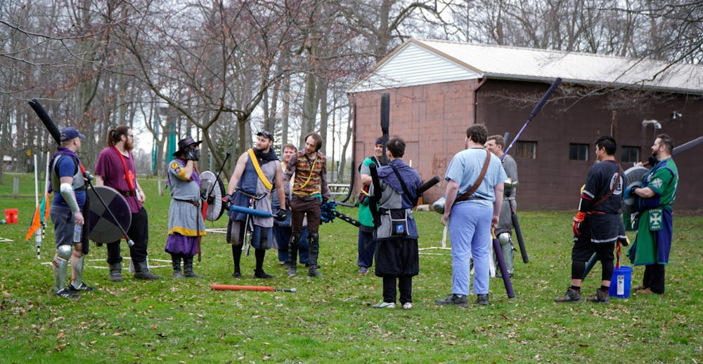 Players appear to be picking teams at Ashen Hills LARP in Patriache Park, on May 1, 2022.
