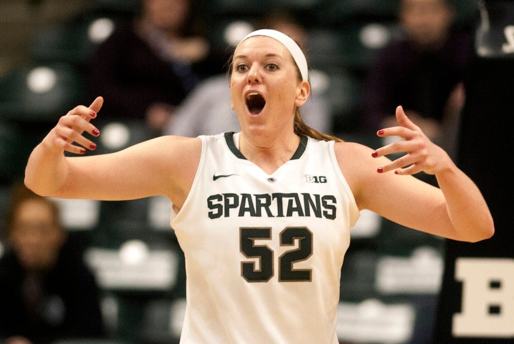 <p>Junior forward Becca Mills reacts when a foul was not called on Michigan on March 7, 2014, at Bankers Life Fieldhouse in Indianapolis. The Spartans won, 61-58, to advance to the third round of the Big Ten Tournament. Betsy Agosta/The State News</p>