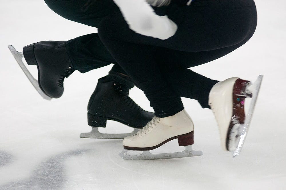	<p>Haslett, Mich. resident Sam Parks, 14, and East Lansing resident Devin Pascoe, 15, skate Jan. 22, 2014, at Suburban Ice East Lansing, 2810 Hannah Blvd. The two began skating separately when they were three years old. Danyelle Morrow/The State News</p>