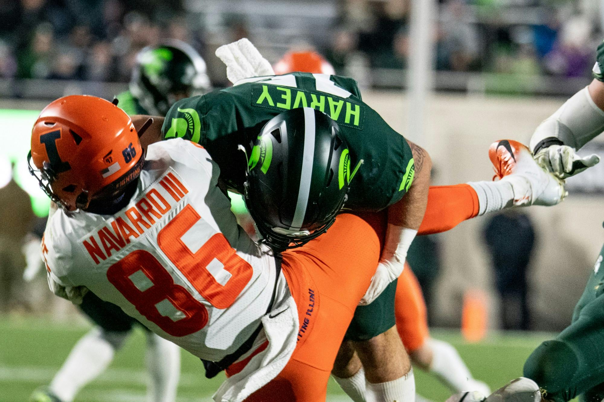 Sophomore linebacker Noah Harvey (45) tackles a ball carrier during the game against Illinois Nov. 9, 2019 at Spartan Stadium. The Spartans fell to the Fighting Illini, 37-34.