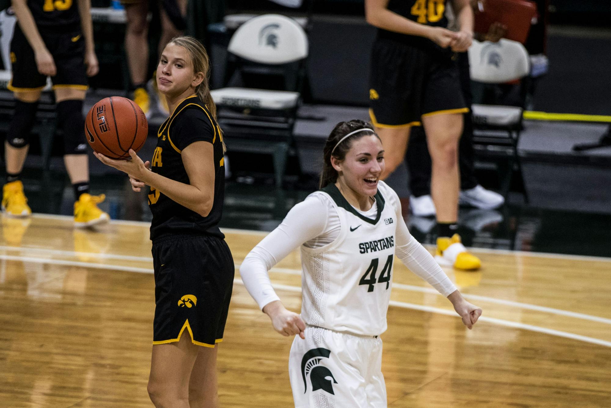 Freshman forward Kendall Bostic (44) excited for the teams win during the game against Iowa on December 12, 2020 at the Breslin Center. The Spartans defeated the Hawkeyes 86-82.