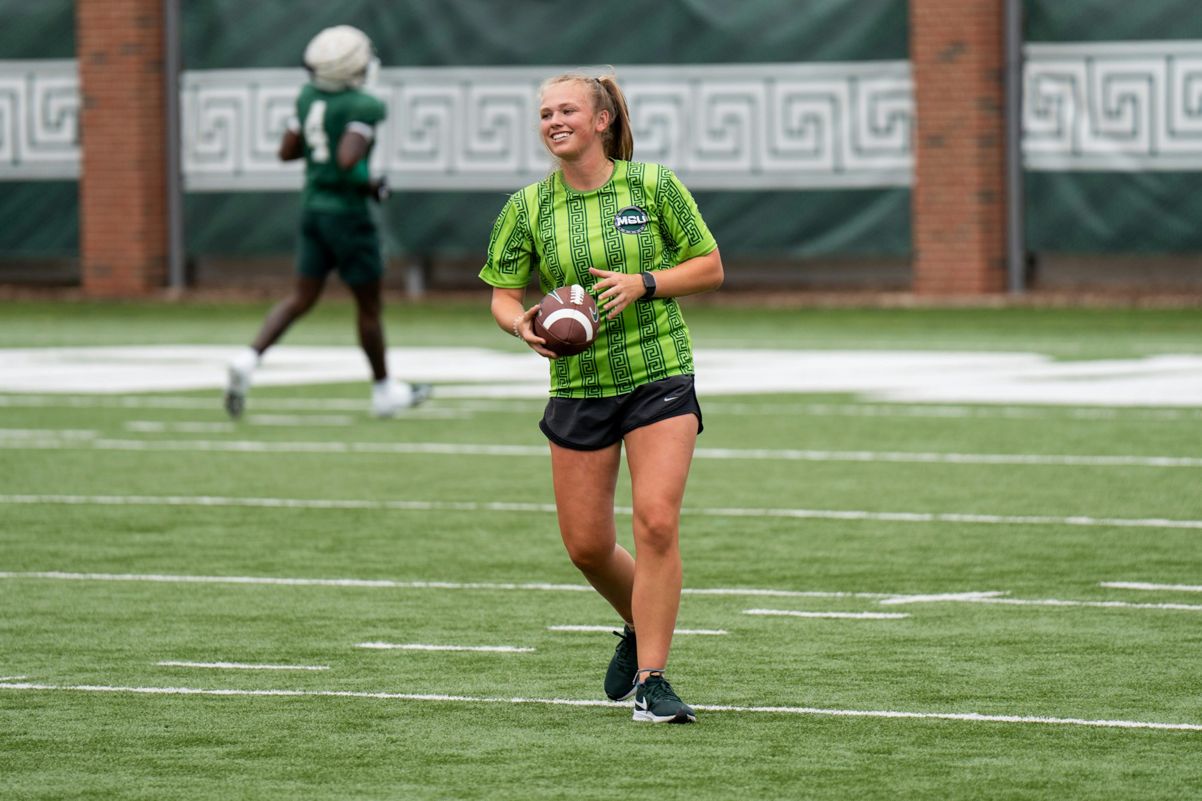 Equipment manager Paeton Hayes at an open practice on Aug. 22, 2022.
