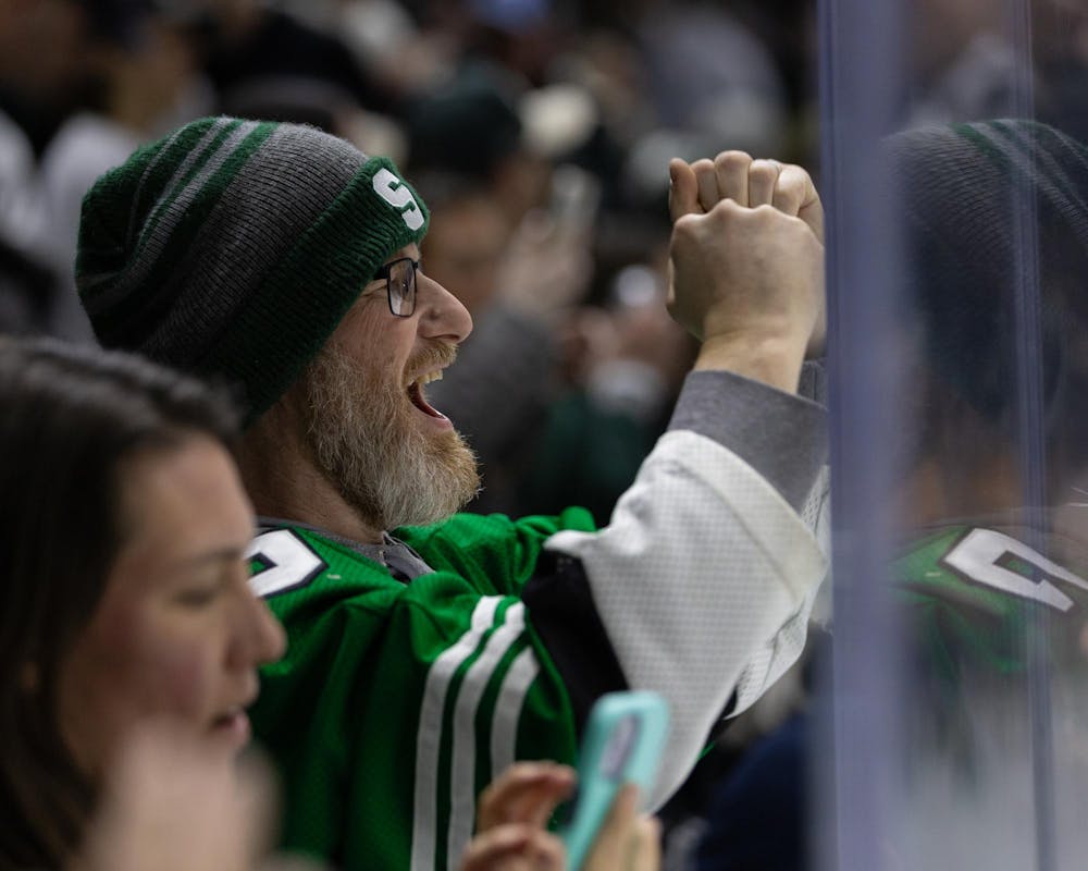 An MSU hockey fan celebrates MSU's victory over Minnesota in Munn Ice Arena in East Lansing, MI on Jan. 23, 2026.