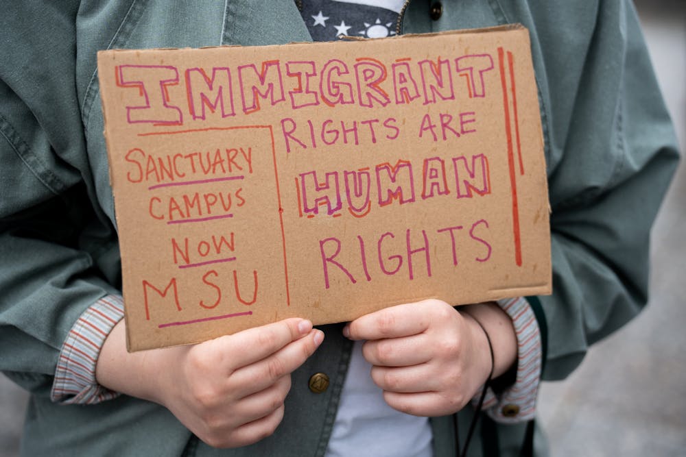 <p>A supporter holds a sign at DreaMSU&#x27;s rally. DreaMSU had a rally in front of the Hannah Administration Building in support of immigrant students on April 8, 2022.</p>