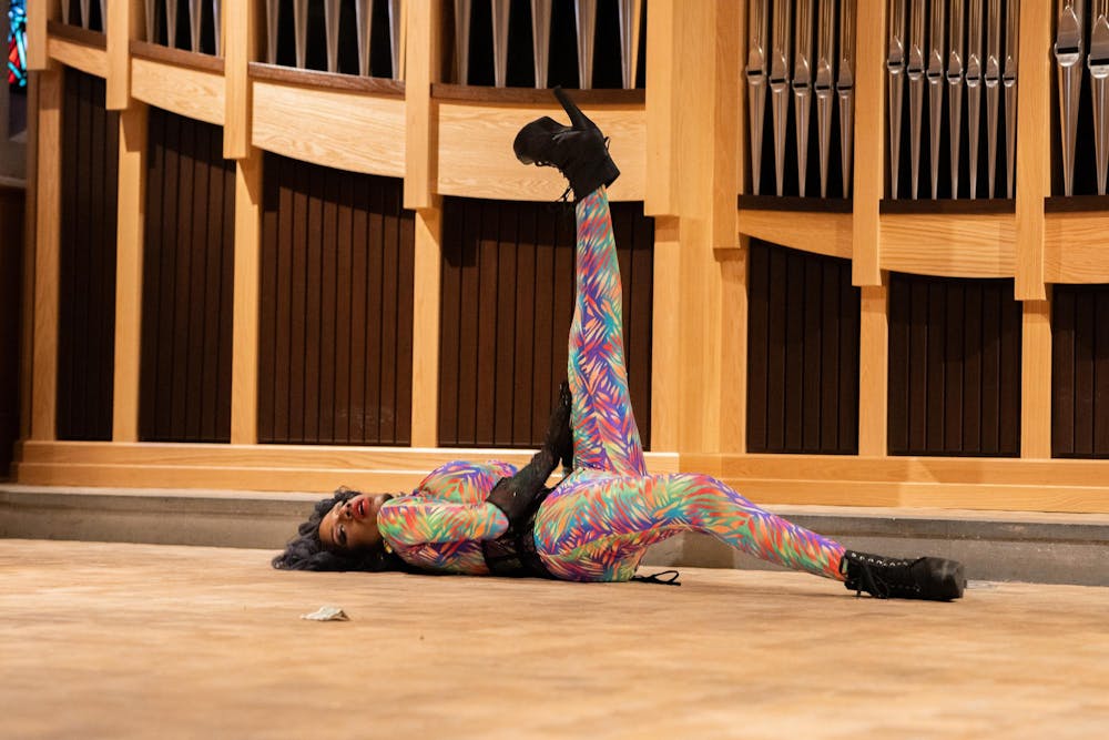 <p>Drag performer Armon Caston, whose stage name is Mutha Auroara Manifesto, performs their set on April 13. Students were in awe as Caston performed stunts.</p>