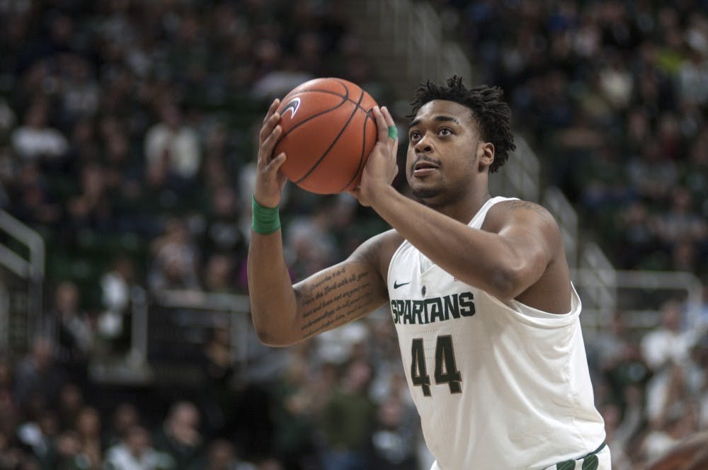 Freshman forward Nick Ward (44) shoots a free throw during the men's basketball game against Tennessee Tech on Dec. 10, 2016 at Breslin Center. 