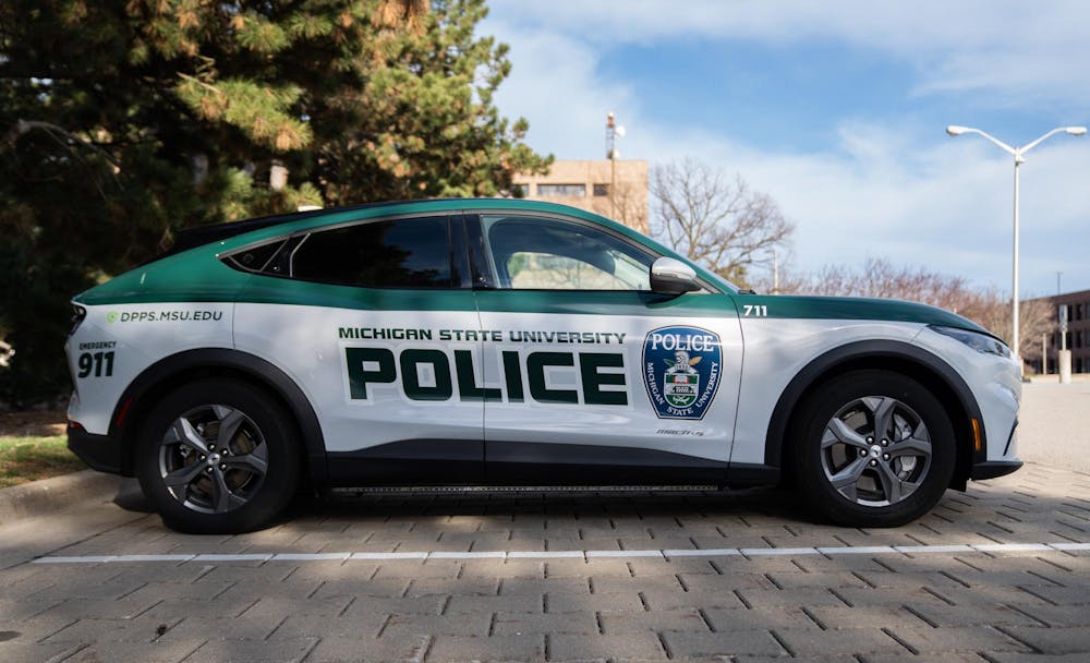 A police car parked outside of the Michigan State University Police Department  on Thursday, April 6, 2023.
