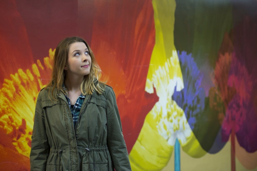 International relations junior Sarah Taylor poses for a portrait on April 12, 2016 at Holden Hall. Taylor has grapheme-color synesthesia, which she described as a condition when "letters and numbers have their own distinct color associations."