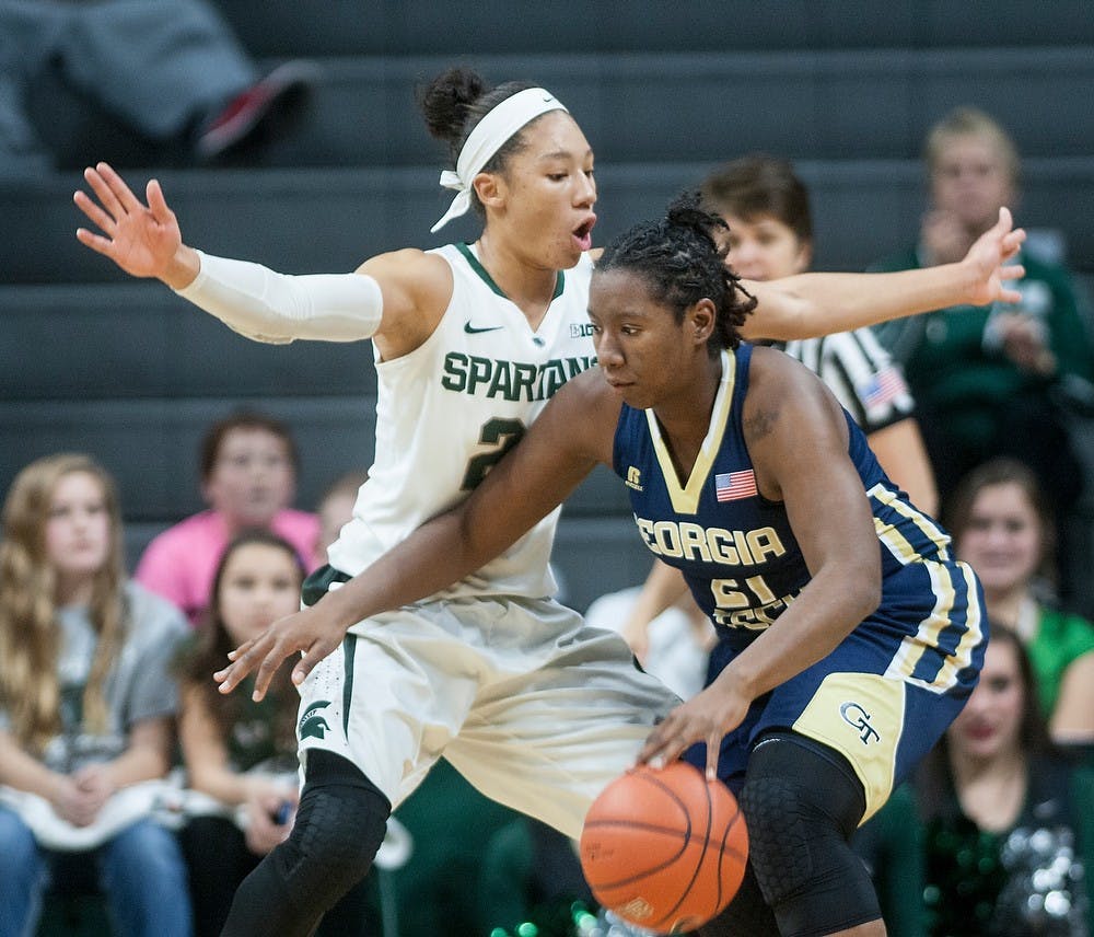 <p>Sophomore forward Aerial Powers guards Georgia Tech forward Zaire O'Neil Dec. 4, 2014, at Breslin Center. The Spartans defeated the Yellow Jackets in overtime, 79-73. Raymond Williams/The State News</p>