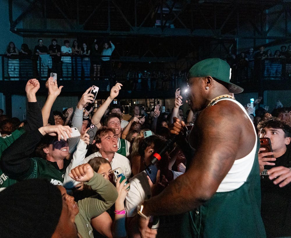 DaBaby interacts with fans during his concert in Grewall Hall in Lansing, MI on Oct. 11, 2025.