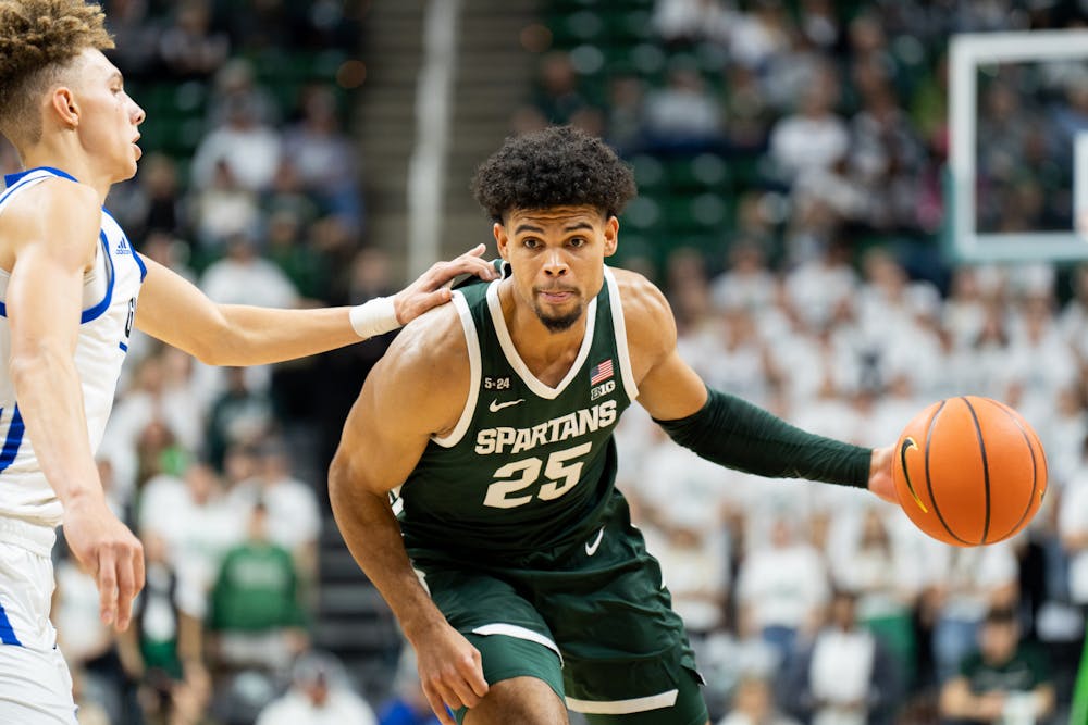 Senior forward Malik Hall drives the lane during Michigan State men's basketball's exhibition match with Grand Valley State on Nov. 1, 2022.