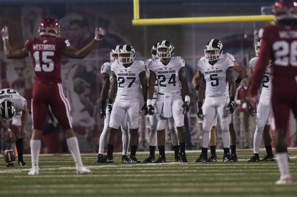 The Spartans take the field after a time out during the game against Indiana on Oct. 1, 2016 at Memorial Stadium in Bloomington, Ind. The Spartans were defeated by the Hoosiers in overtime, 24-21.