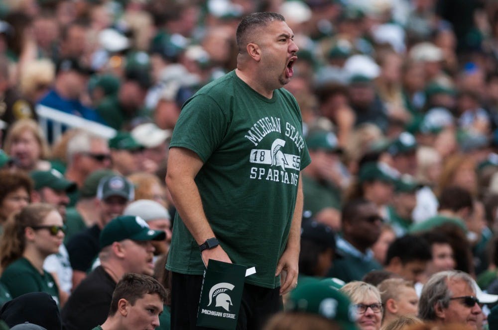 A Spartan fan shouts in protest of a penalty against MSU during the game against Northwestern at Spartan Stadium on Oct. 6, 2018.