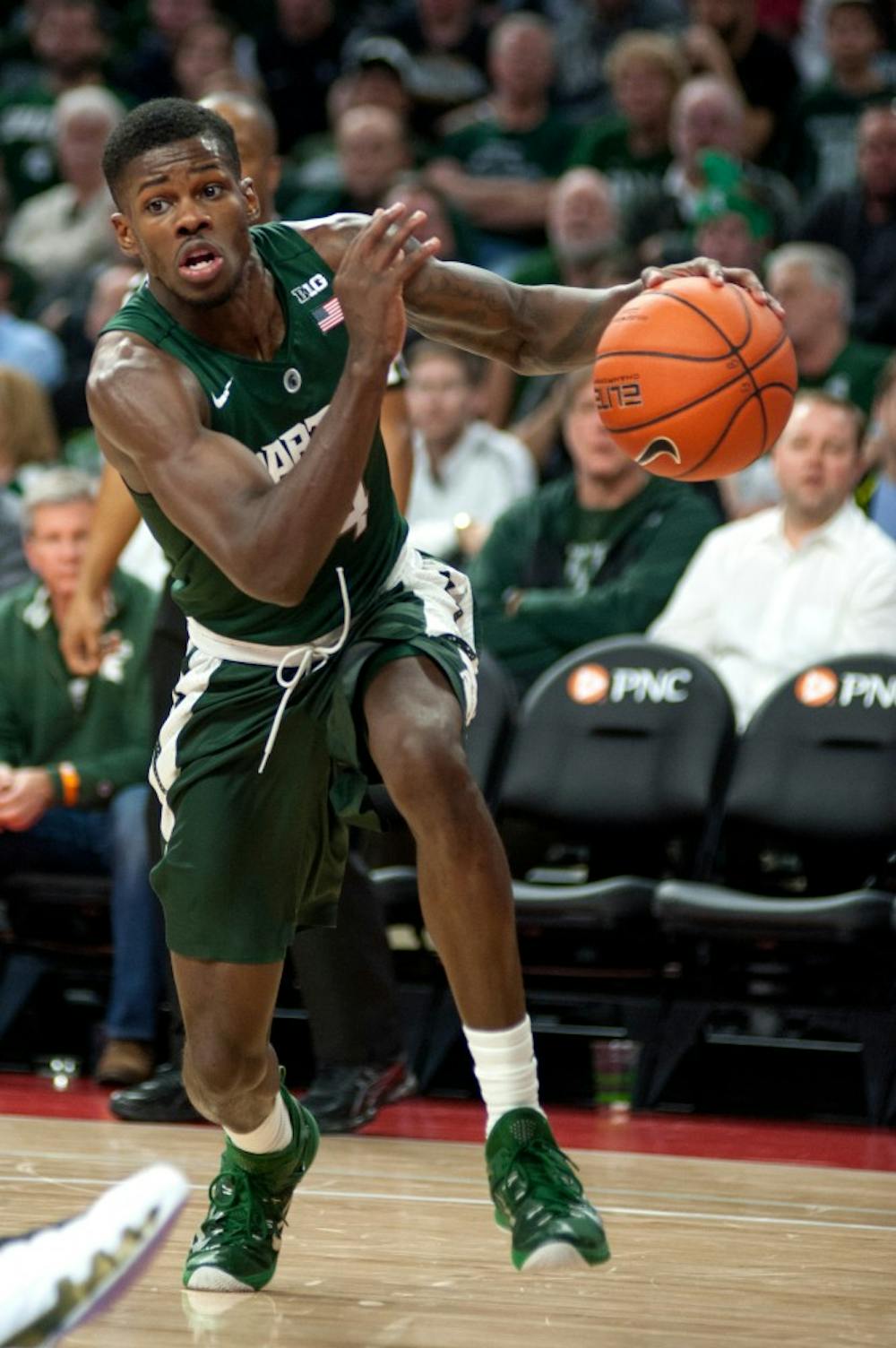 Junior guard Eron Harris drives the ball to the net on Dec. 22, 2015 during the game against Oakland University at the Palace of Auburn Hills in Auburn Hills, Mich. The Spartans defeated the Grizzlies, 99-93 in overtime.