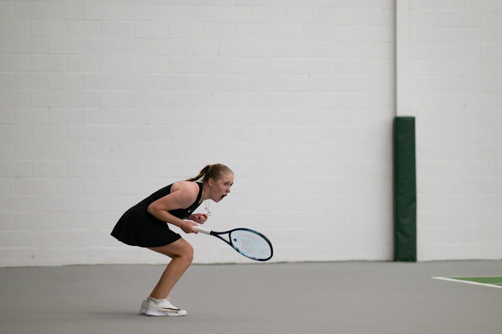 Hanna Tsitavets, a redshirt junior, celebrates a point win after a rally during a singles match at the MSU Tennis Center on Friday, Feb. 6, 2026.