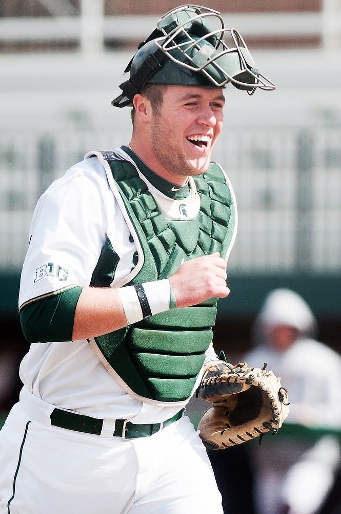 	<p>Sophomore catcher/first baseman Blaise Salter runs off the field after the end of an inning during the game against Central Michigan on Tuesday, April 2, 2013, during the <span class="caps">MSU</span> home opener. <span class="caps">MSU</span> beat <span class="caps">CMU</span> 4-2, and is due to play Michigan during the next home game on Friday, April 5, 2013. Danyelle Morrow/The State News</p>
