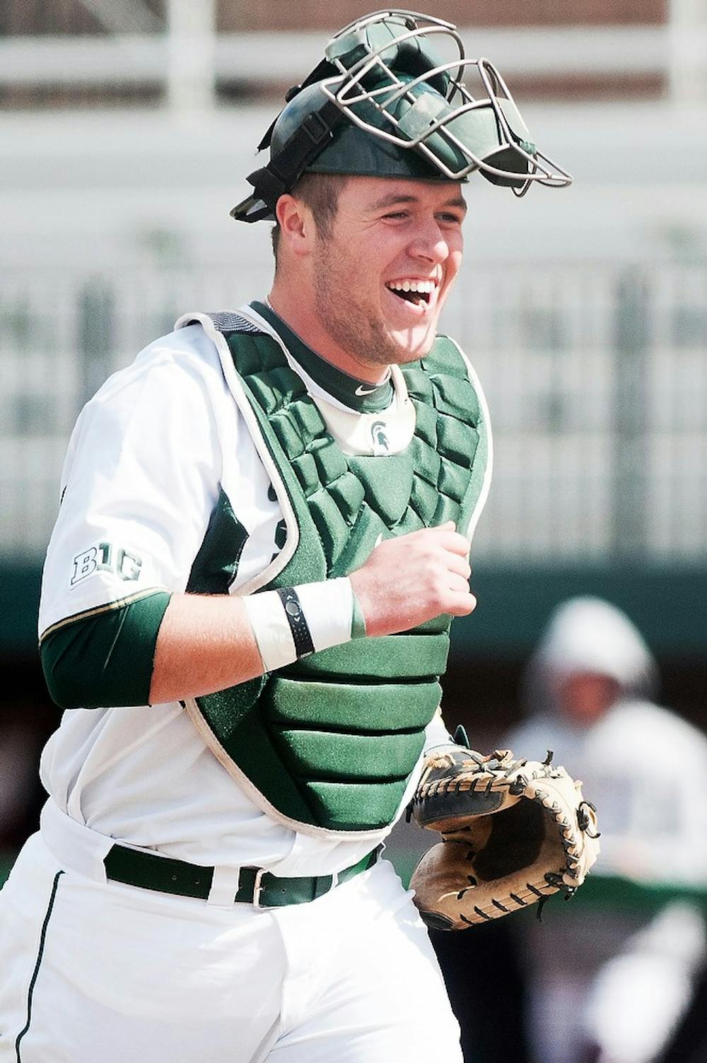 	<p>Sophomore catcher/first baseman Blaise Salter runs off the field after the end of an inning during the game against Central Michigan on Tuesday, April 2, 2013, during the <span class="caps">MSU</span> home opener. <span class="caps">MSU</span> beat <span class="caps">CMU</span> 4-2, and is due to play Michigan during the next home game on Friday, April 5, 2013. Danyelle Morrow/The State News</p>