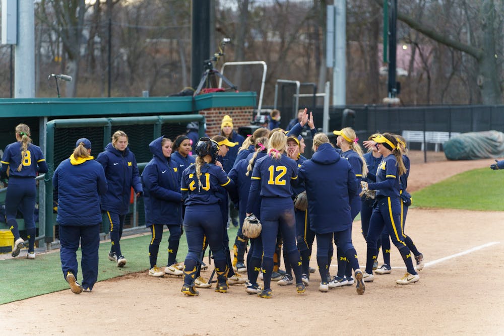 <p>Michigan celebrating after a really successful fourth inning, in which they scored a run and stopped the Spartans from scoring. Michigan State lost 3-0 to Michigan at the Secchia Stadium, on April 19, 2022.</p>