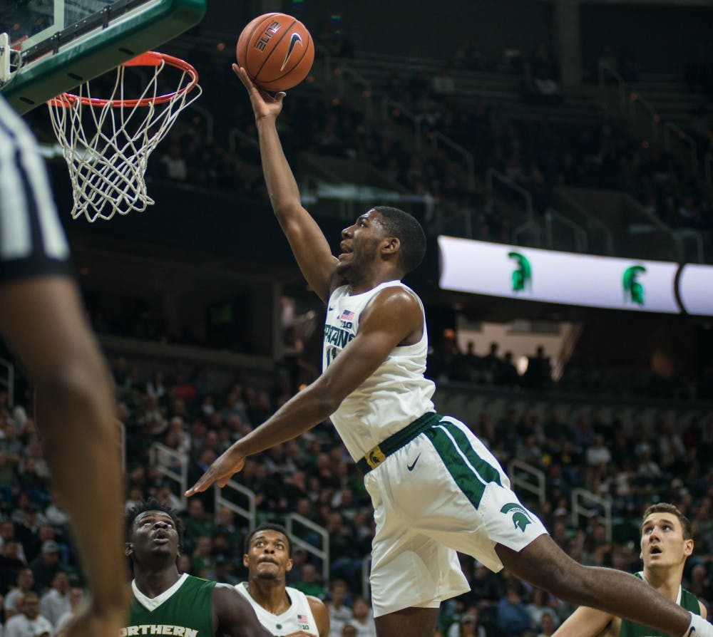 Freshman forward Aaron Henry (11) makes a basket during the game against Northern Michigan at Breslin Center on Oct. 30, 2018. The Spartans defeated the Wildcats, 93-47.