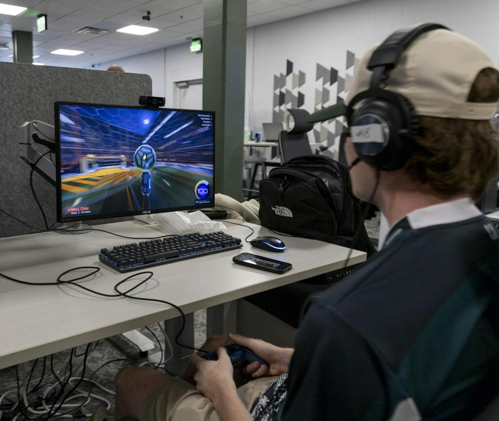 <p>Michigan State digital storytelling sophomore Christian Riegert plays Rocket League in the Hubbard Esports Gaming Hub in East Lansing, Mich., on Thursday, Sept. 17, 2026.</p>