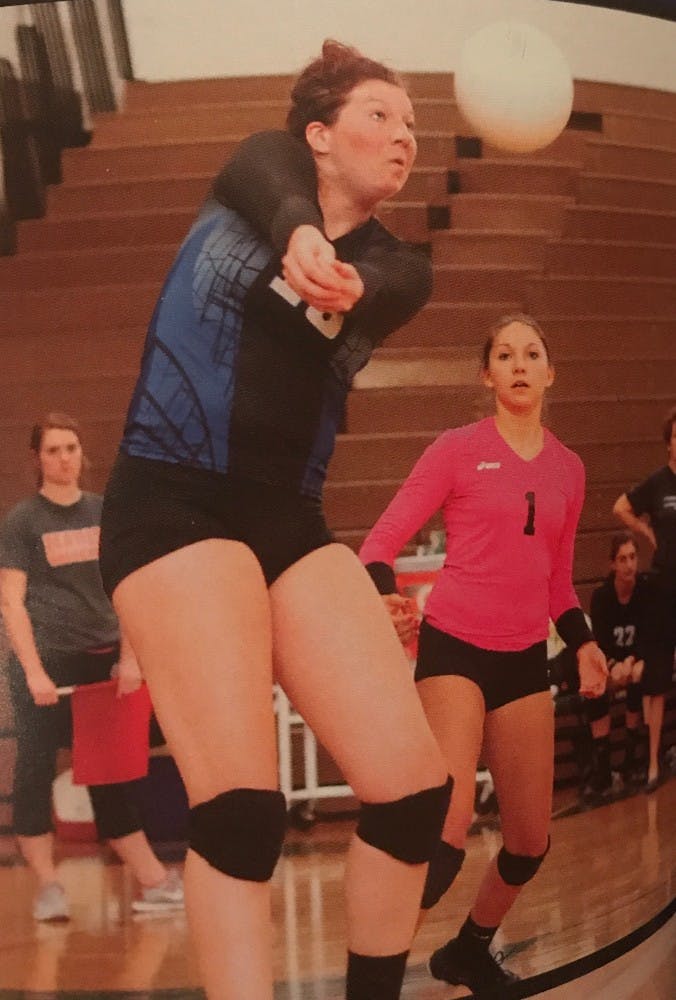 Maddie Haggerty gets ready to bump the ball to her setter during her senior year of high school at St. Francis 