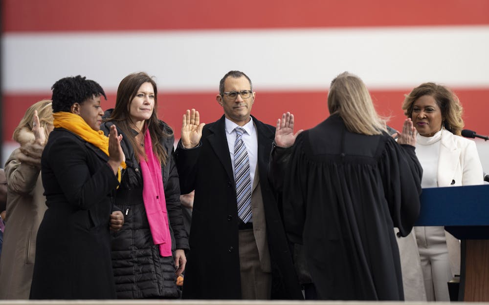 <p>State education officials, including Michigan State University Trustees Renee Knake Jefferson and Dennis Denno, take their oaths of office during the 2023 Gubernatorial Inauguration on Sunday, Jan. 1, 2023, at the Michigan State Capitol.</p>