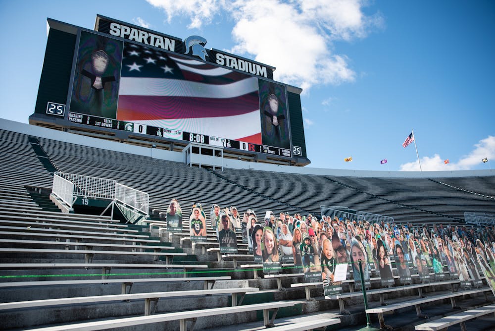 MSU stadium houses the first Spartan football game of the season on Oct. 24, 2020. Cardboard cutouts of fans cheer on from the stands.