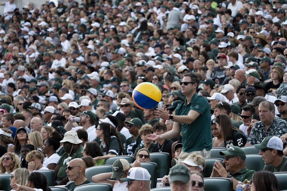 <p>A MSU fan throws a beach ball into the crowd at the MSU vs Prairie View football game on Sept. 14, 2024.</p>